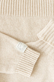 Chunky knit merino wool turtleneck sweater ecru