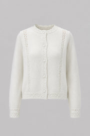 A delicate buttoned cardigan made of ecru alpaca wool and girl's wool.