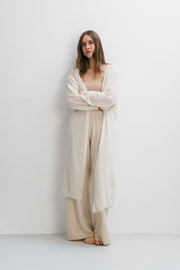 Long cardigan made of baby alpaca wool and ecru virgin wool.