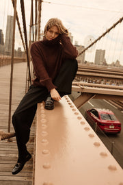 Knitted seamless oversized turtleneck sweater with roll-up cuffs, made of kid mohair and merino wool, brown