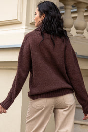 Knitted seamless oversized turtleneck sweater with roll-up cuffs, made of kid mohair and merino wool, brown