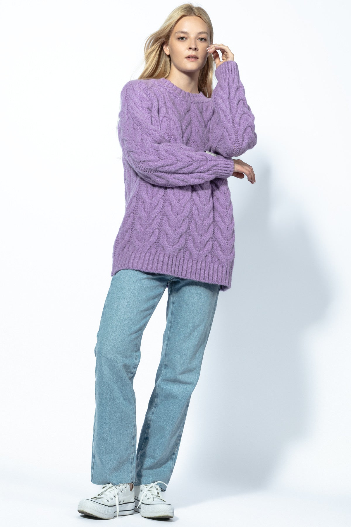 Warm purple cable-knit sweater with a neckline