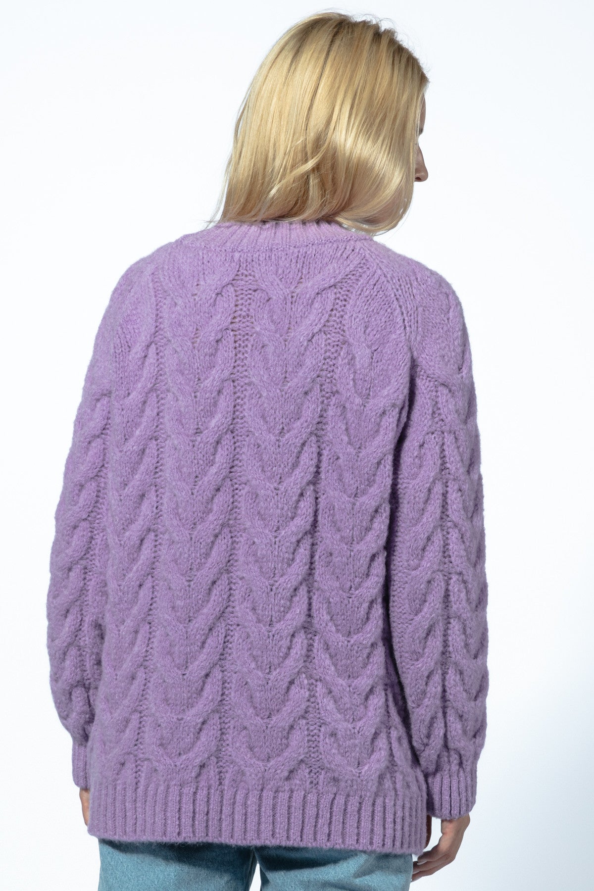 Warm purple cable-knit sweater with a neckline