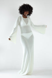 Long openwork dress with a neckline at the back made of ecru cotton