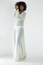 Long openwork dress with a neckline at the back made of ecru cotton