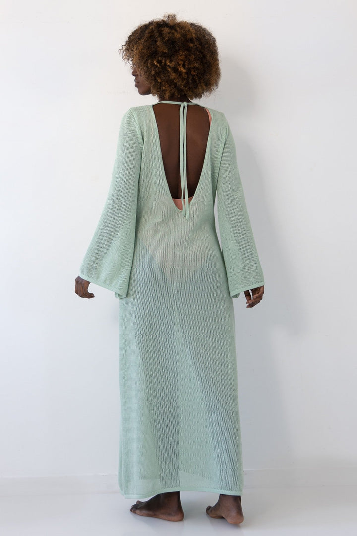 Long dress with cleavage on the back of pistachio cotton