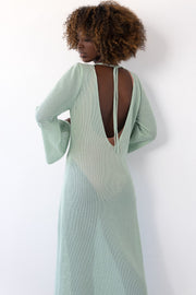 Long openwork dress with a neckline on the back made of pistachio cotton