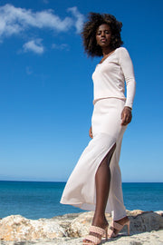 Elegant, very delicate set of a skirt and a nude blouse