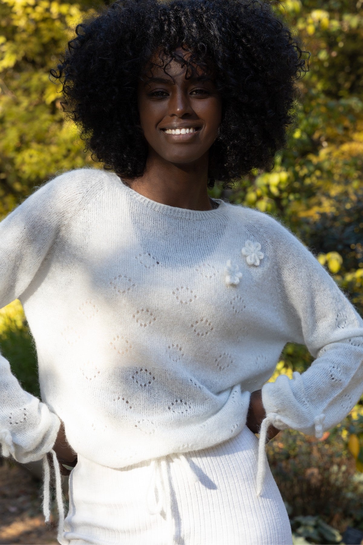 Elegant ecru hand-decorated suri wool sweater