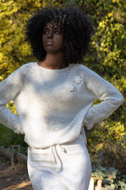 Elegant ecru hand-decorated suri wool sweater