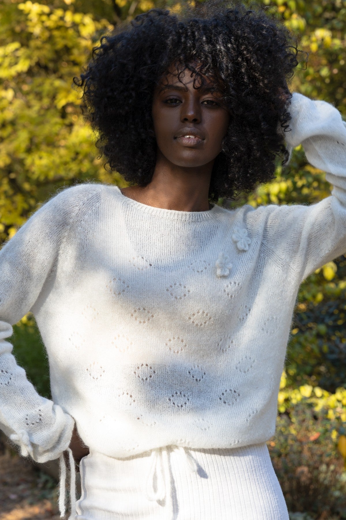 Elegant ecru hand-decorated suri wool sweater