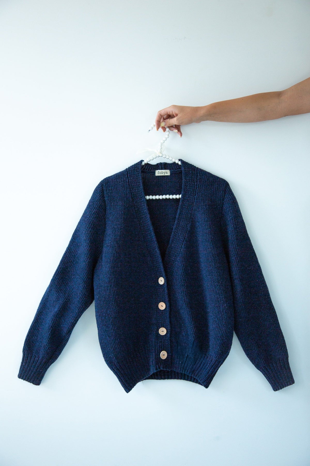 Navy blue buttoned merino wool cardigan