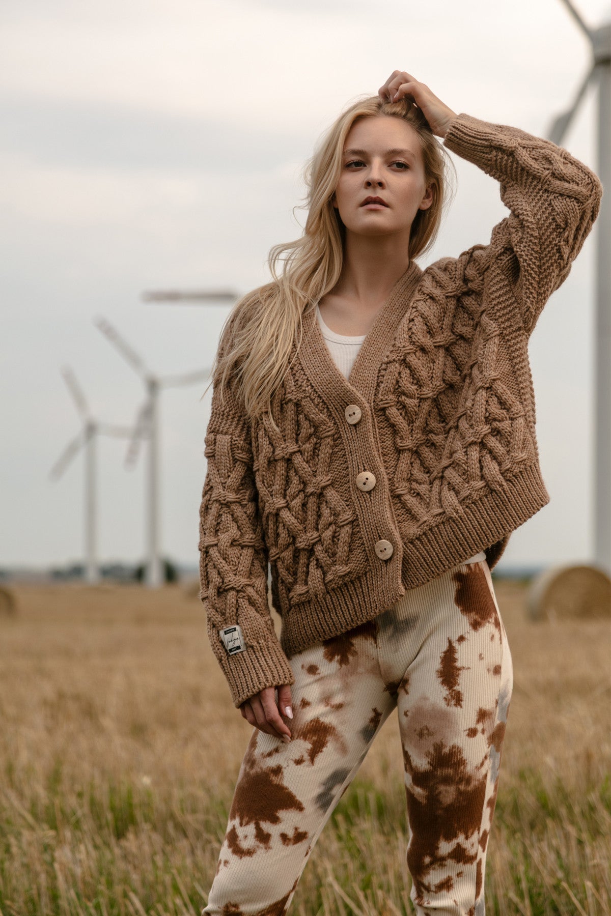 Classic buttoned cardigan with a caramel aran weave