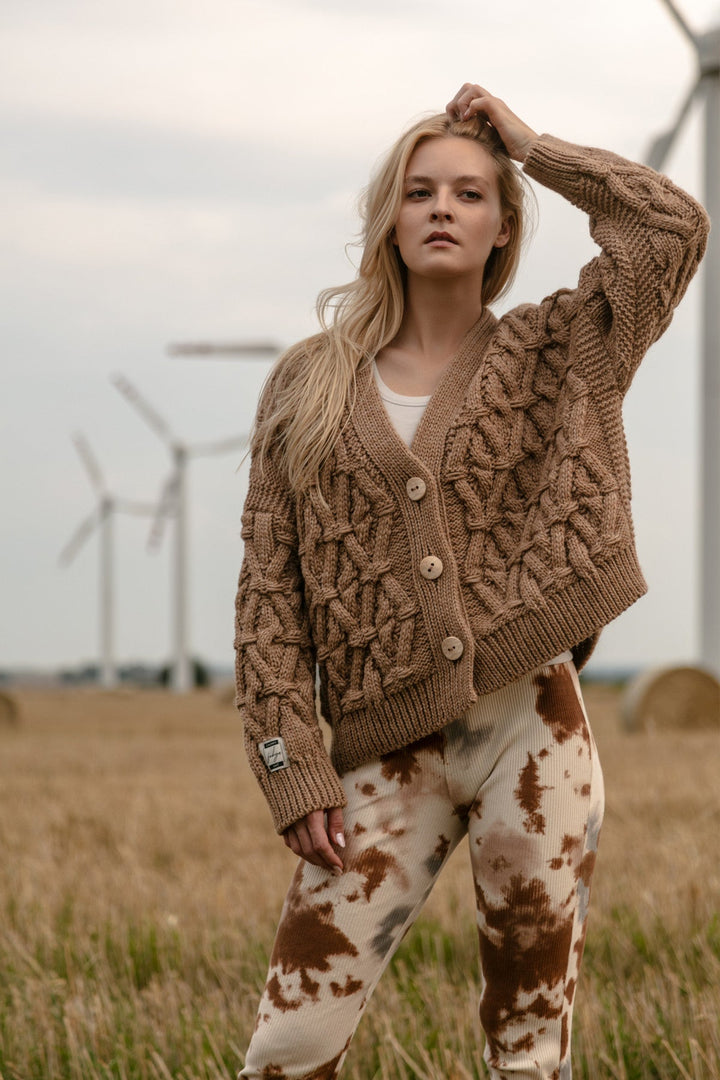 Classic buttoned cardigan with a caramel aran weave