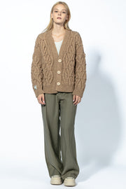 Classic buttoned cardigan with a caramel aran weave