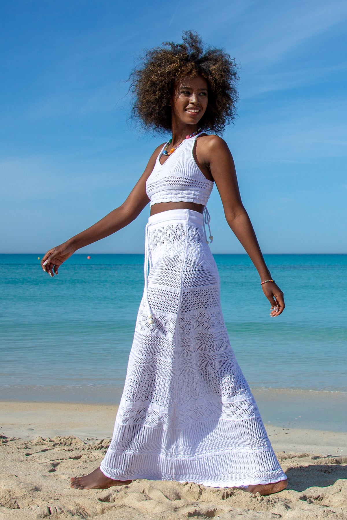 Colorful, cotton openwork set of a top and a long skirt in white