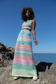 Colorful, cotton openwork set of a top and a long pistachio skirt