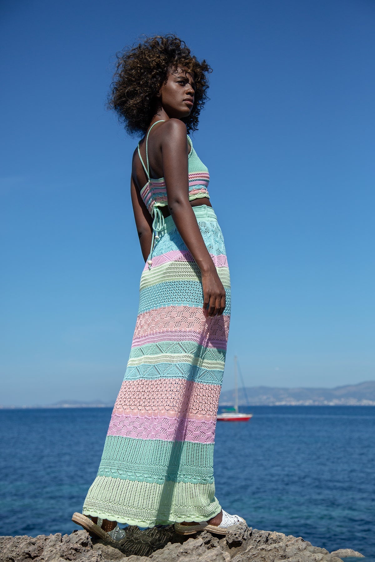 Colorful, cotton openwork set of a top and a long pistachio skirt