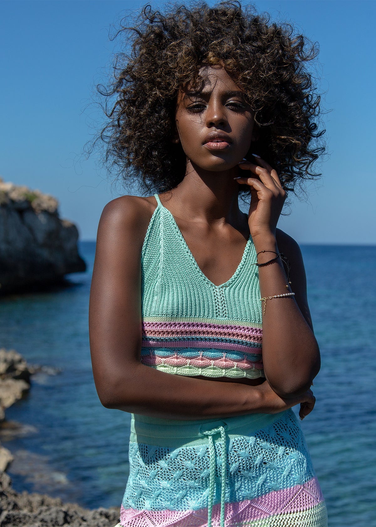Colorful, cotton openwork set of a top and a long pistachio skirt