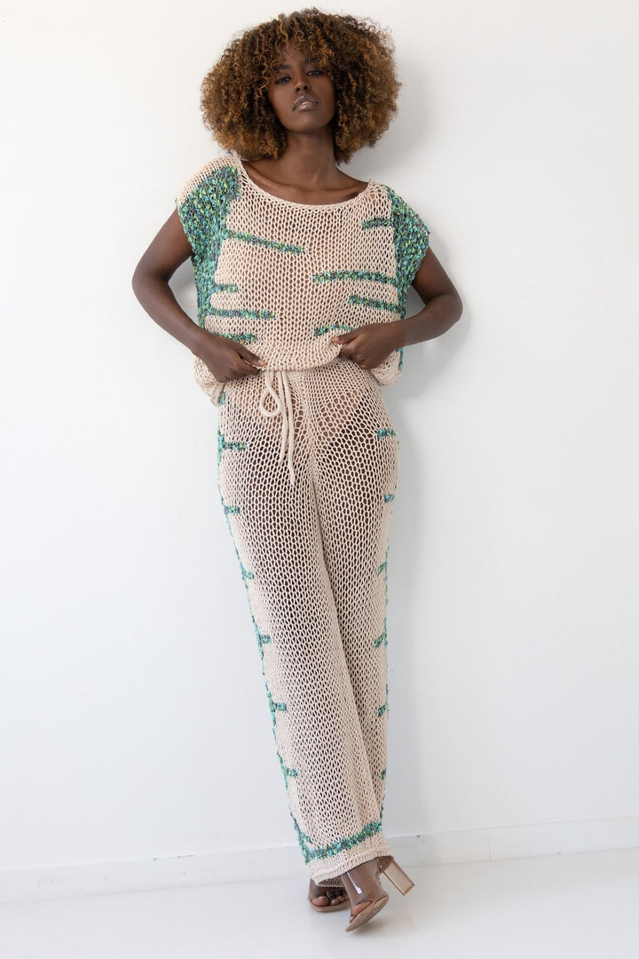beige blouse and trousers set