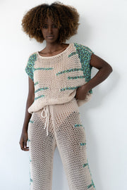 beige blouse and trousers set