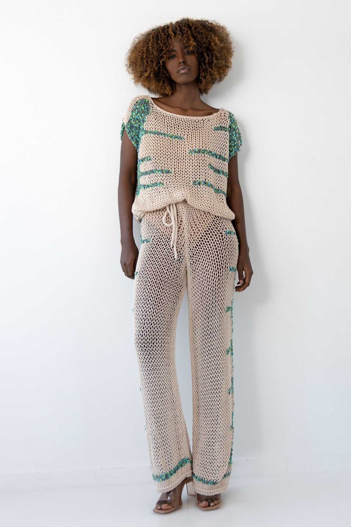 beige blouse and trousers set