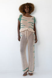 beige blouse and trousers set