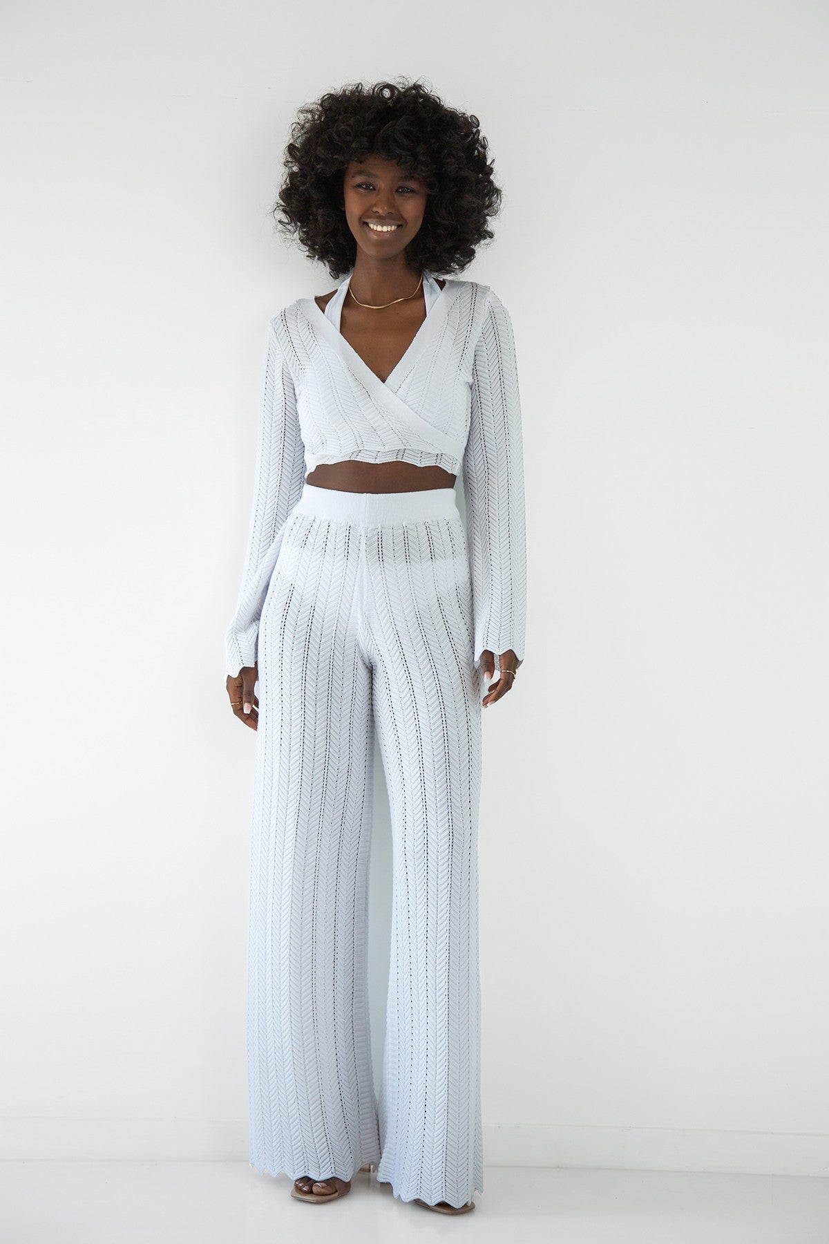 Set of long lace trousers and white tie blouse