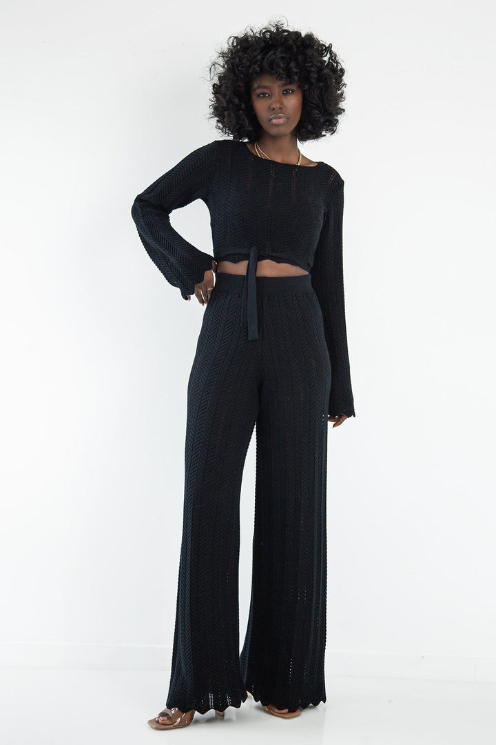 Set of long lace trousers and black tie blouse