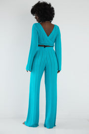 Set of long openwork trousers and a tied blouse in blue