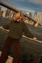 Thick woolen sweater with a cable knit, olive green