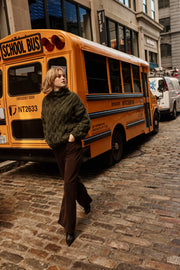 Thick woolen sweater with a cable knit, olive green