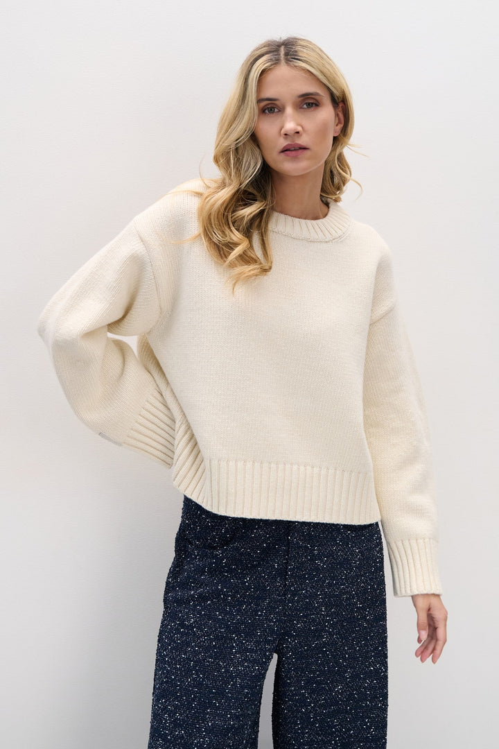 Merinos wool sweater with a thick ecru weave