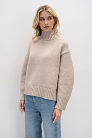 Beige chunky merino wool turtleneck sweater