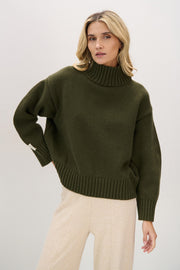 Chunky knit merino wool turtleneck sweater in olive green