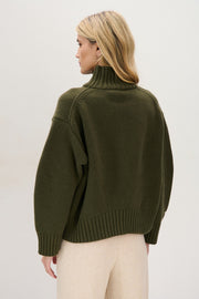 Chunky knit merino wool turtleneck sweater in olive green
