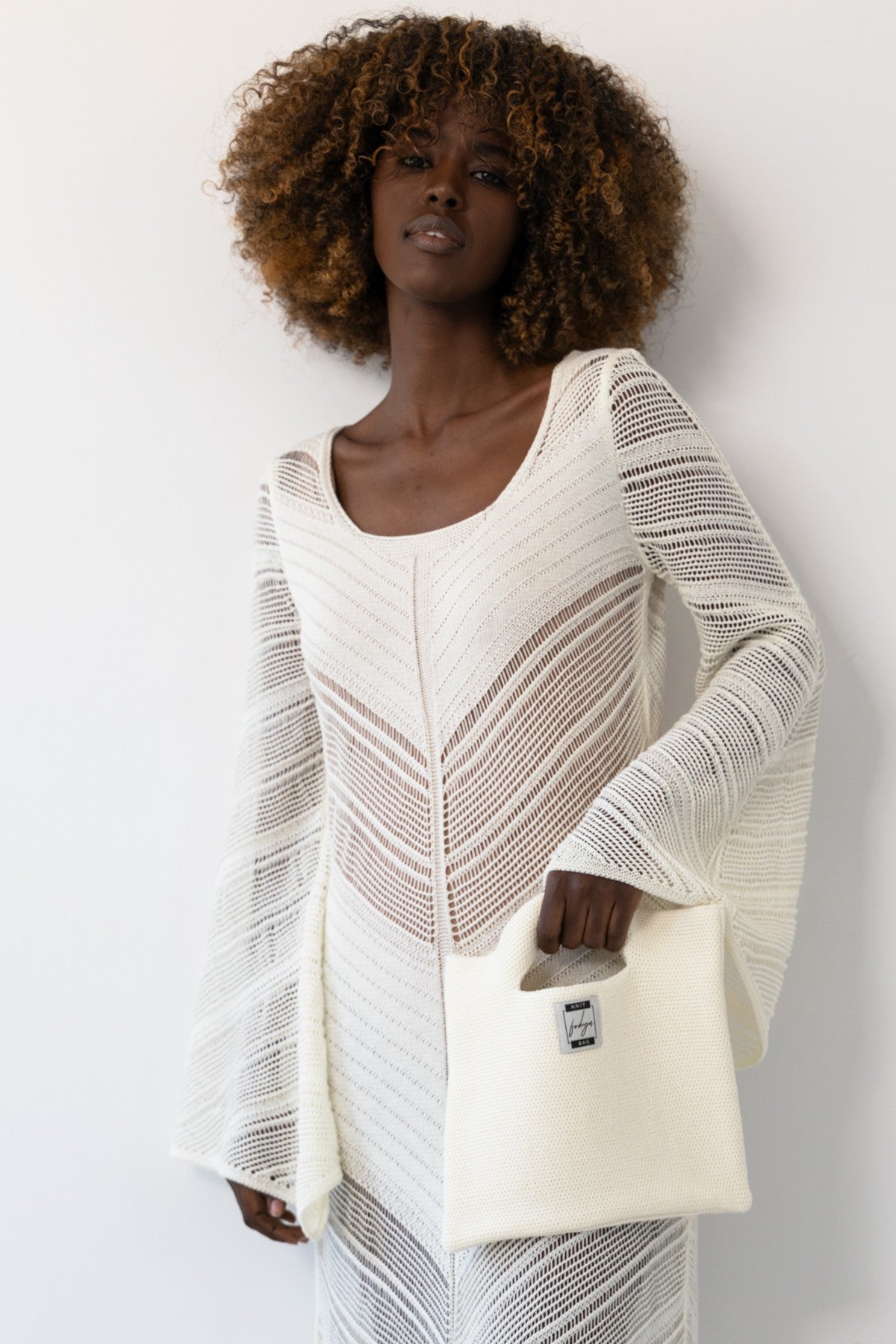 Knitted bag made of ecru cotton