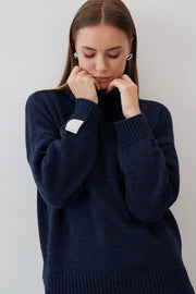 Loose wool turtleneck sweater, navy blue