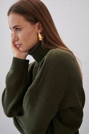 Loose woolen turtleneck sweater olive