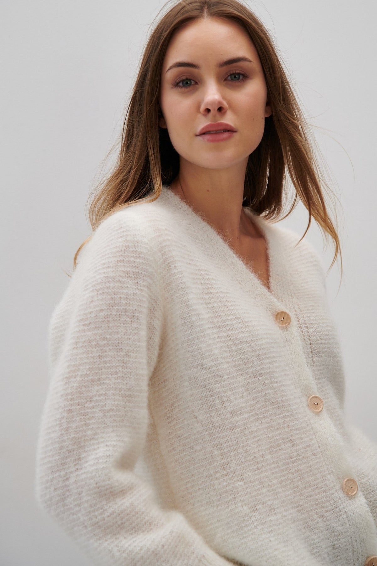 Button-up cardigan made of undyed ecru alpaca wool