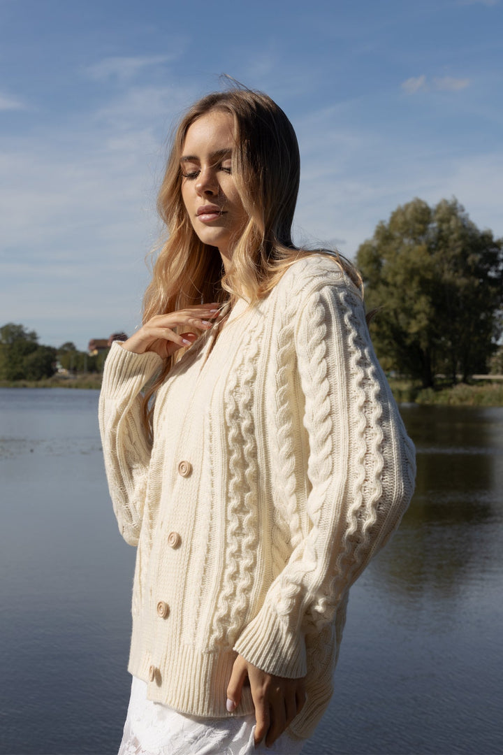 Buttoned ecru wool cardigan